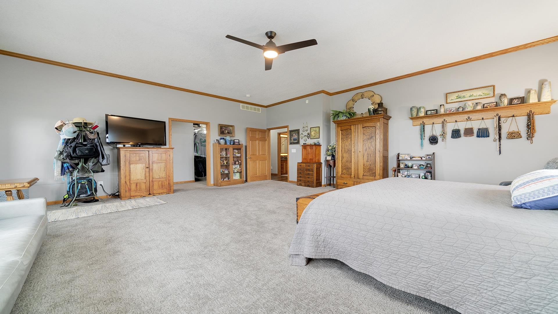 2765 West Pines Road Oregon, IL 61061 - Photo 33 of 79 a bed room with a bed and a ceiling fan