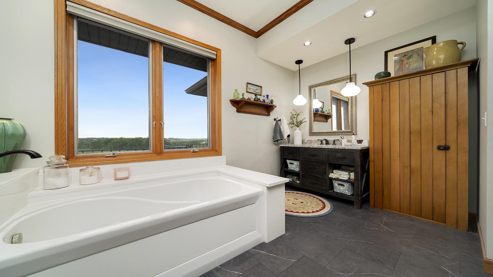 2765 West Pines Road Oregon, IL 61061 - Photo 35 of 79 a bathroom with a sink a toilet and a bathtub