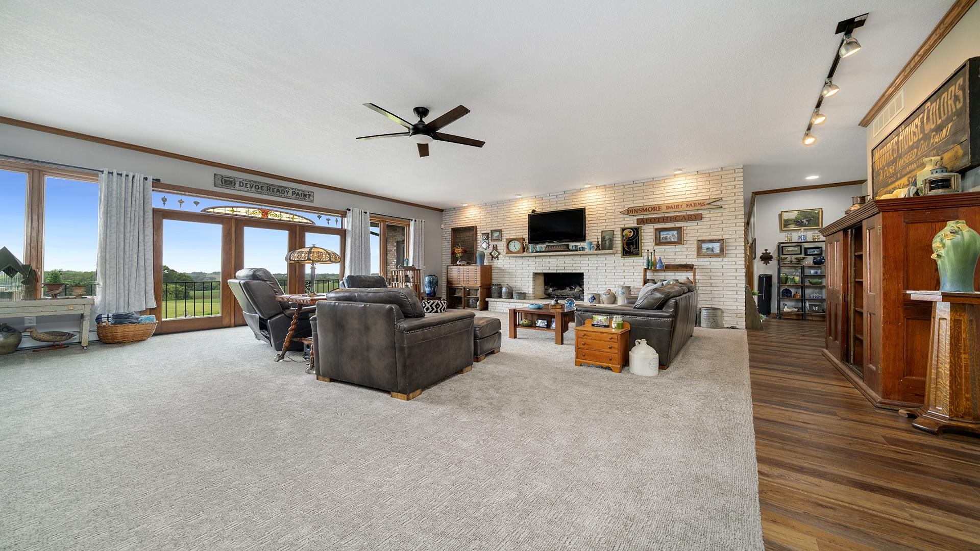 2765 West Pines Road Oregon, IL 61061 - Photo 5 of 79 a living room with furniture and a flat screen tv