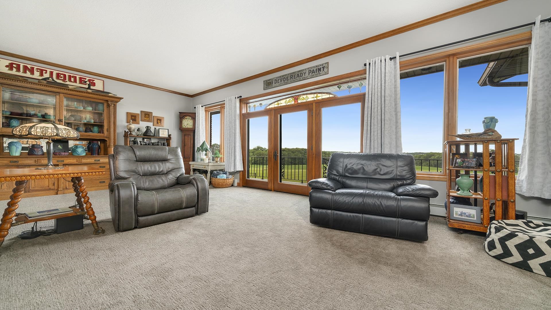 2765 West Pines Road Oregon, IL 61061 - Photo 7 of 79 a living room with furniture and a floor to ceiling window