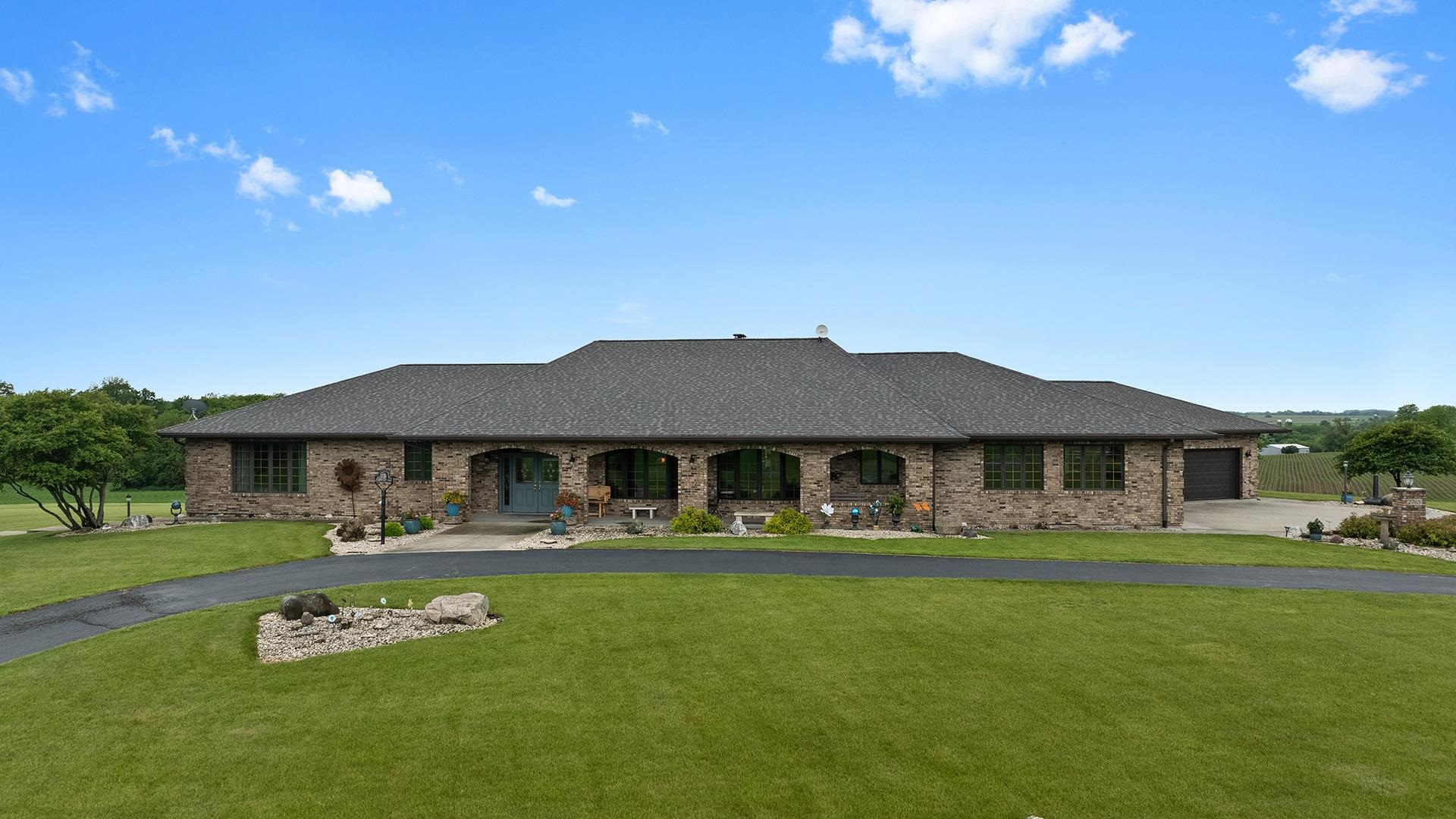 2765 West Pines Road Oregon, IL 61061 - Photo 78 of 79 a front view of a house with garden