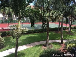 620 South Park Road, Unit 312 Hollywood, FL 33021 - Photo 16 of 20 a view of a garden with a tree