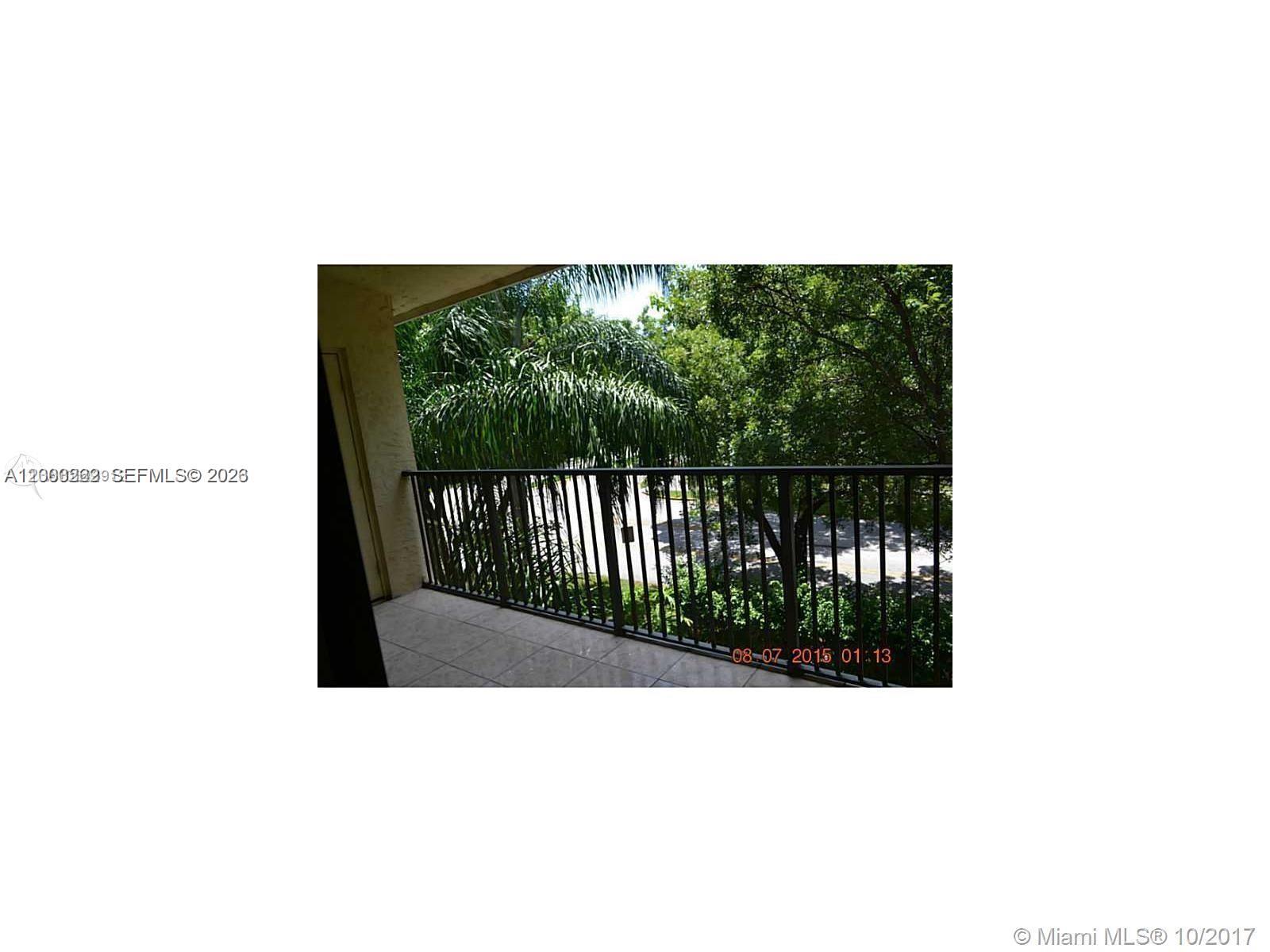 620 South Park Road, Unit 312 Hollywood, FL 33021 - Photo 18 of 20 a picture of a bench in a balcony