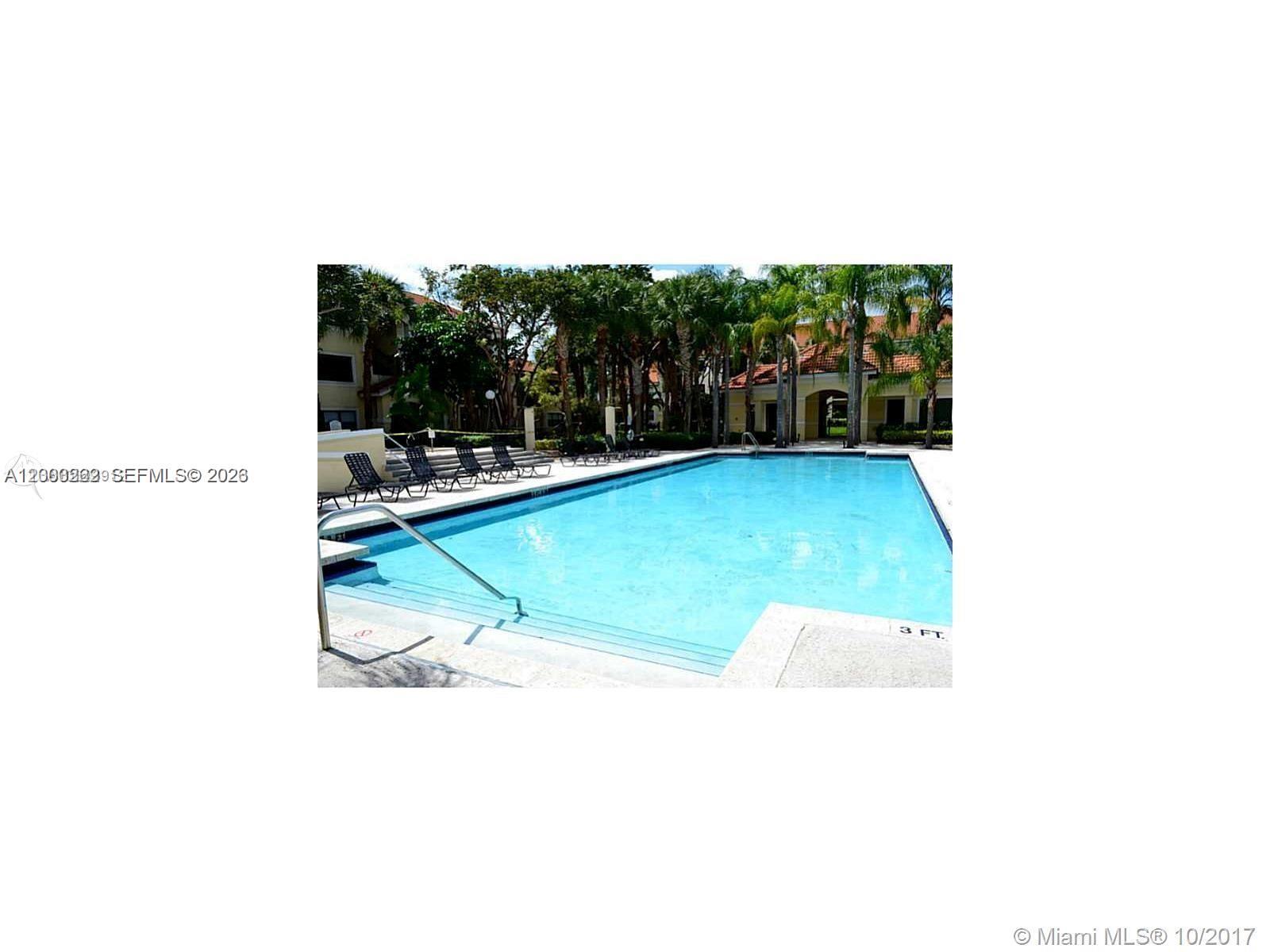 620 South Park Road, Unit 312 Hollywood, FL 33021 - Photo 19 of 20 a view of a swimming pool with an outdoor space