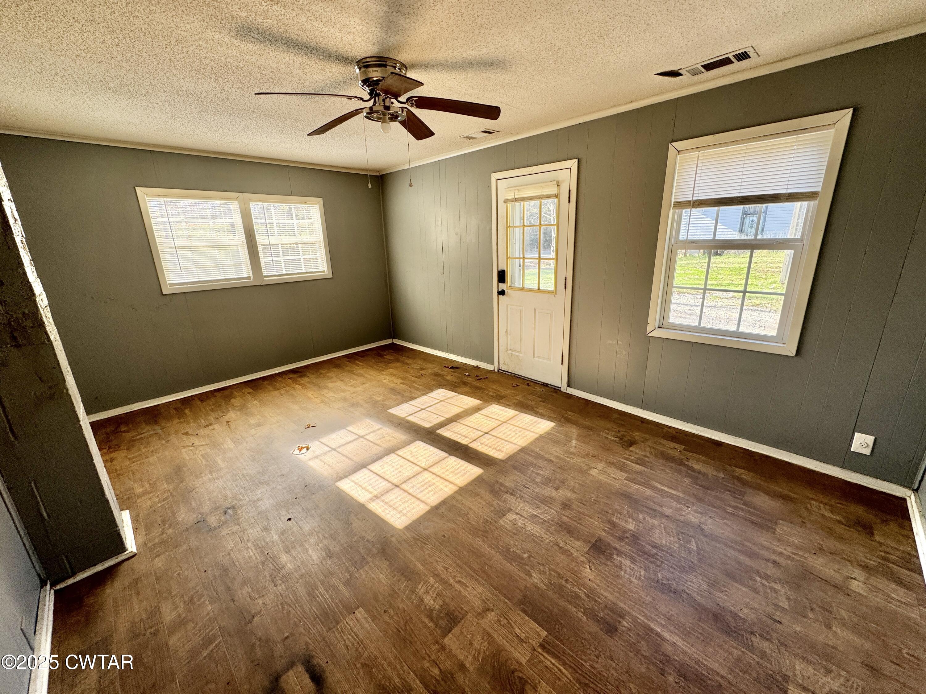 808 Barlow Road Ripley, TN 38063 - Photo 4 of 13 a view of an empty room with a window