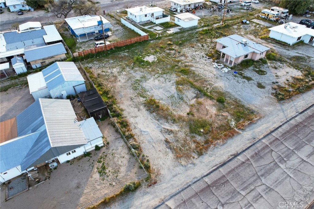 13797 Sutter Street Trona, CA 93562 - Photo 4 of 15 an aerial view of residential houses with outdoor space