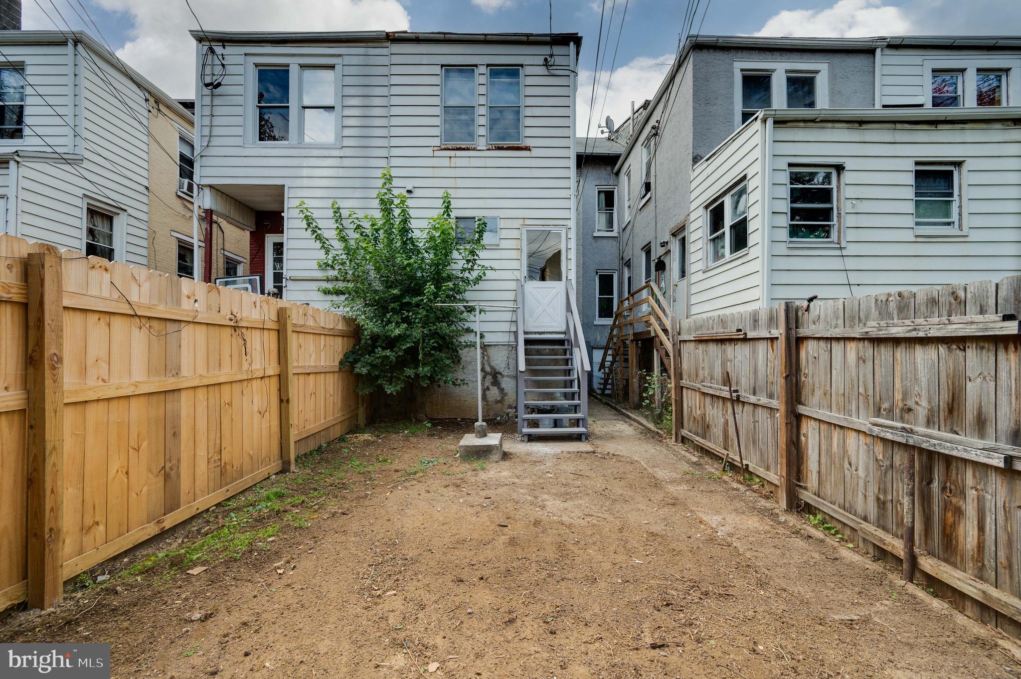 725 Madison Avenue Reading, PA 19601 - Photo 46 of 47 a view of a house with wooden fence