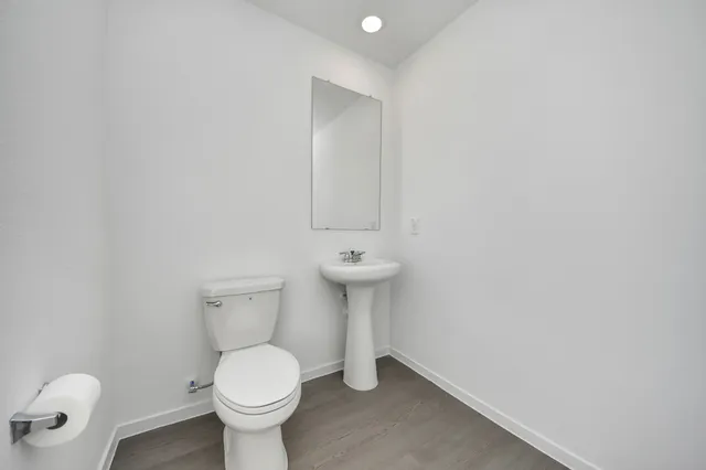 a bathroom with a sink and mirror