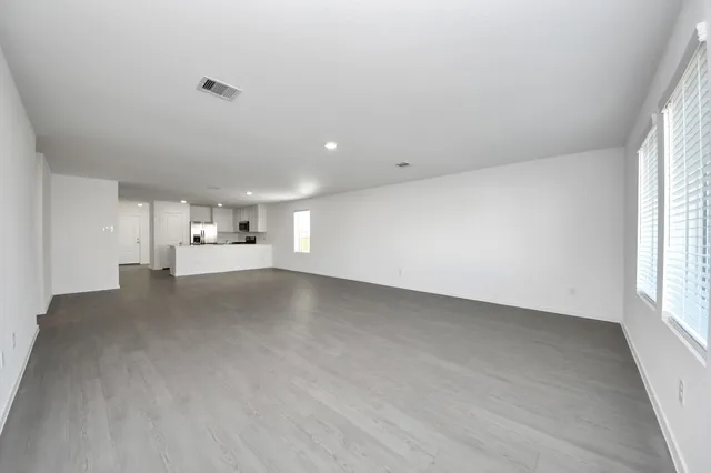 a view of a kitchen with a sink and cabinet