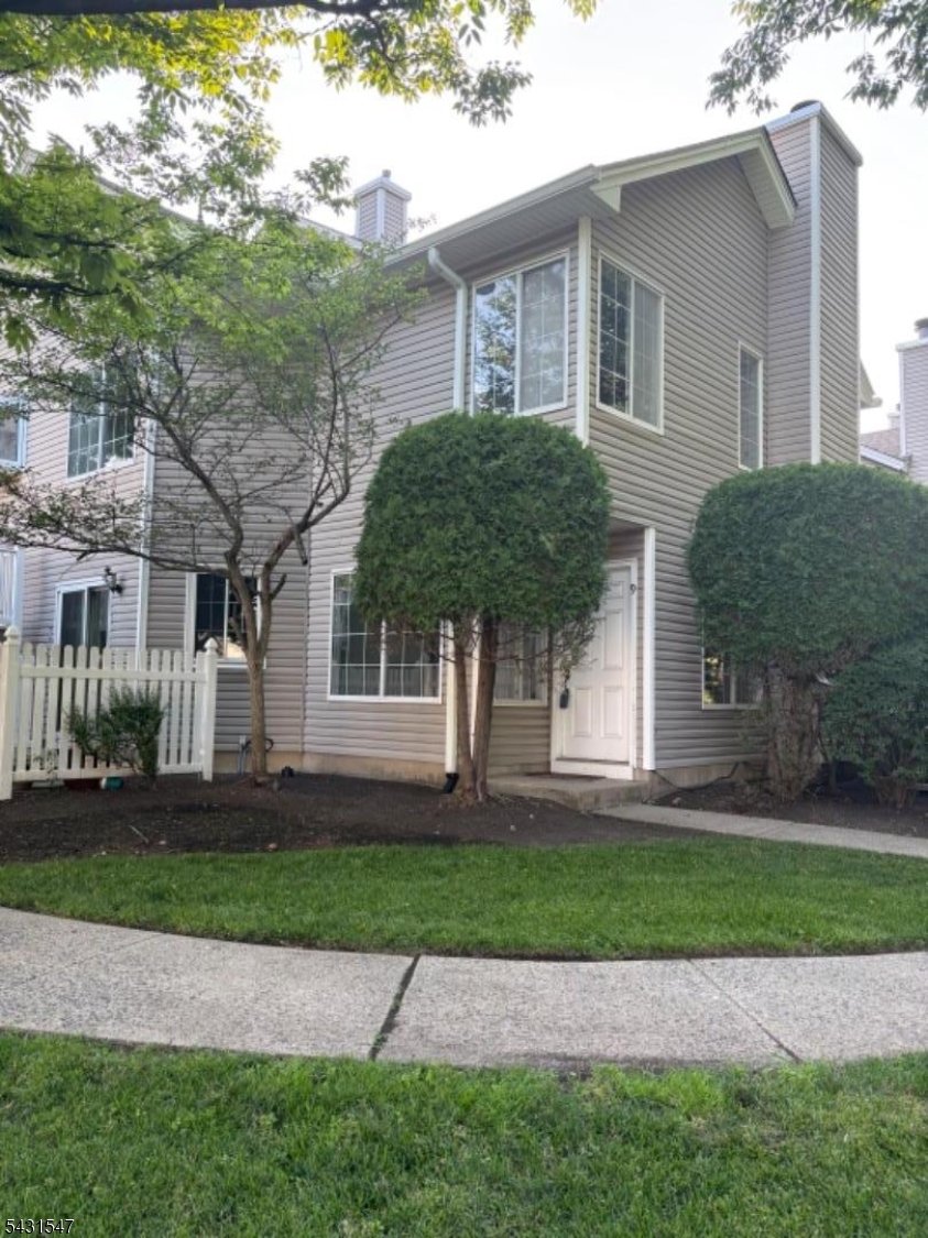 9 Pendleton Court Bedminster, NJ 07921 - Photo 1 of 22 a front view of a house with a yard and garage