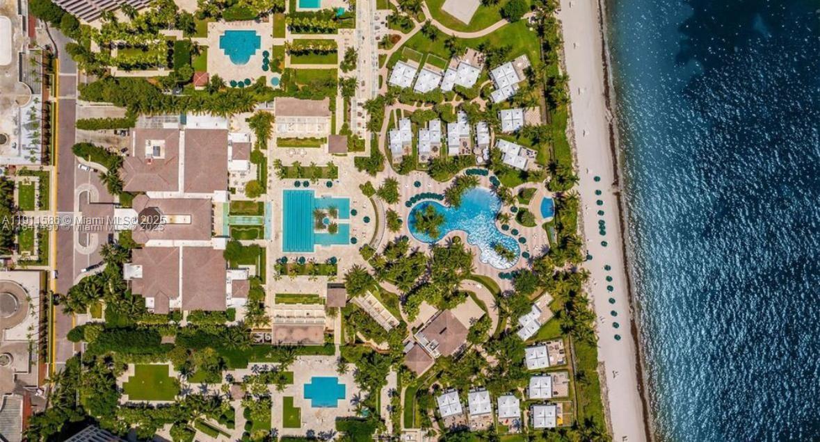 781 Crandon Boulevard, Unit 106 Key Biscayne, FL 33149 - Photo 14 of 20 view of a multi story building