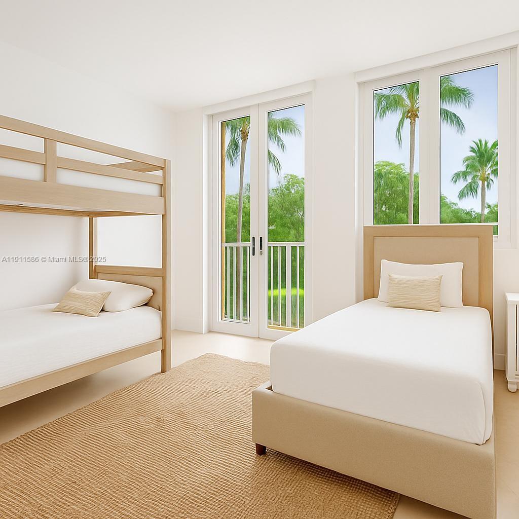 781 Crandon Boulevard, Unit 106 Key Biscayne, FL 33149 - Photo 4 of 20 a bedroom with a large bed and a large window