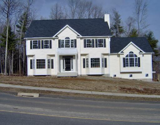 61 Brookfield Road Seymour, CT 06483 - Photo 1 of 1 a view of a white house with street next to a road