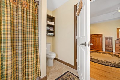 1654 Myers Chapel Road Hayesville, NC 28904 - Photo 25 of 60 a bathroom with a toilet and a shower