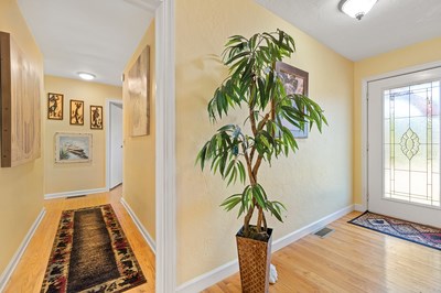 1654 Myers Chapel Road Hayesville, NC 28904 - Photo 27 of 60 a view of an entryway with wooden floor and a potted plant