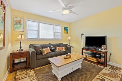 1654 Myers Chapel Road Hayesville, NC 28904 - Photo 28 of 60 a living room with furniture and a flat screen tv