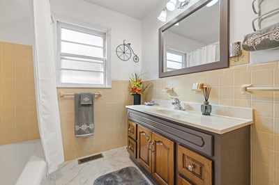 1654 Myers Chapel Road Hayesville, NC 28904 - Photo 36 of 60 a bathroom with a sink and a mirror