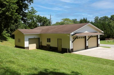 1654 Myers Chapel Road Hayesville, NC 28904 - Photo 53 of 60 a view of a house with a garden and yard