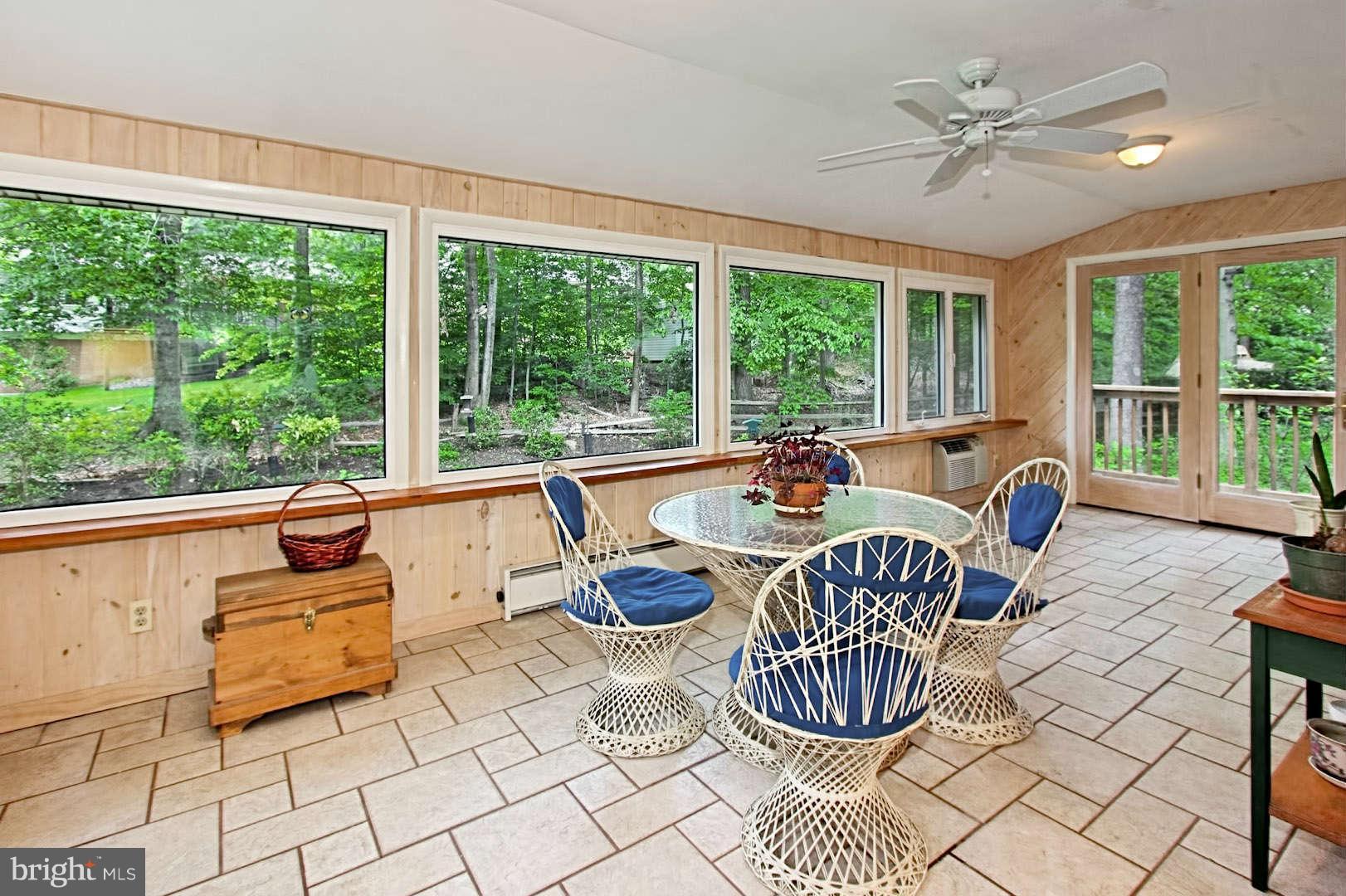 7006 Spaniel Road Springfield, VA 22153 - Photo 14 of 29 a living room with furniture and large windows