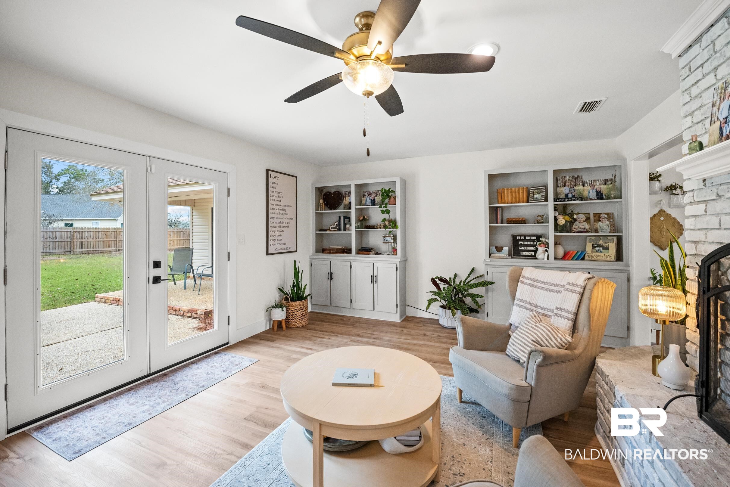 6 Wren Circle Foley, AL 36535 - Photo 36 of 55 Sitting room with visible vents, light wood-style flooring, a ceiling fan, and french doors