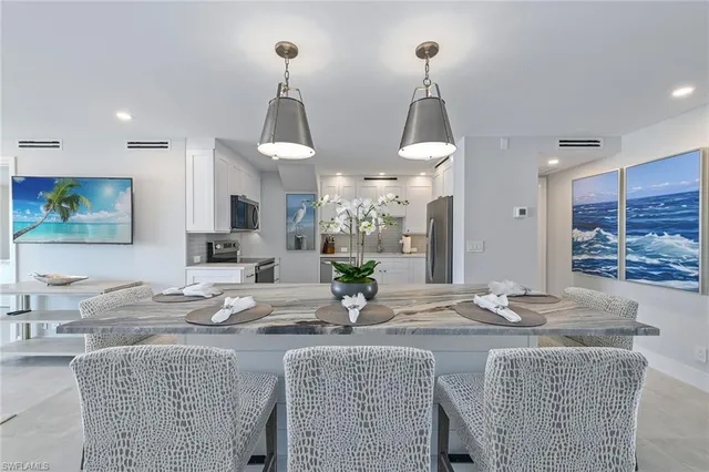a view of a dining room with furniture