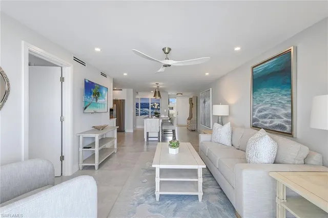 a living room with furniture and a table