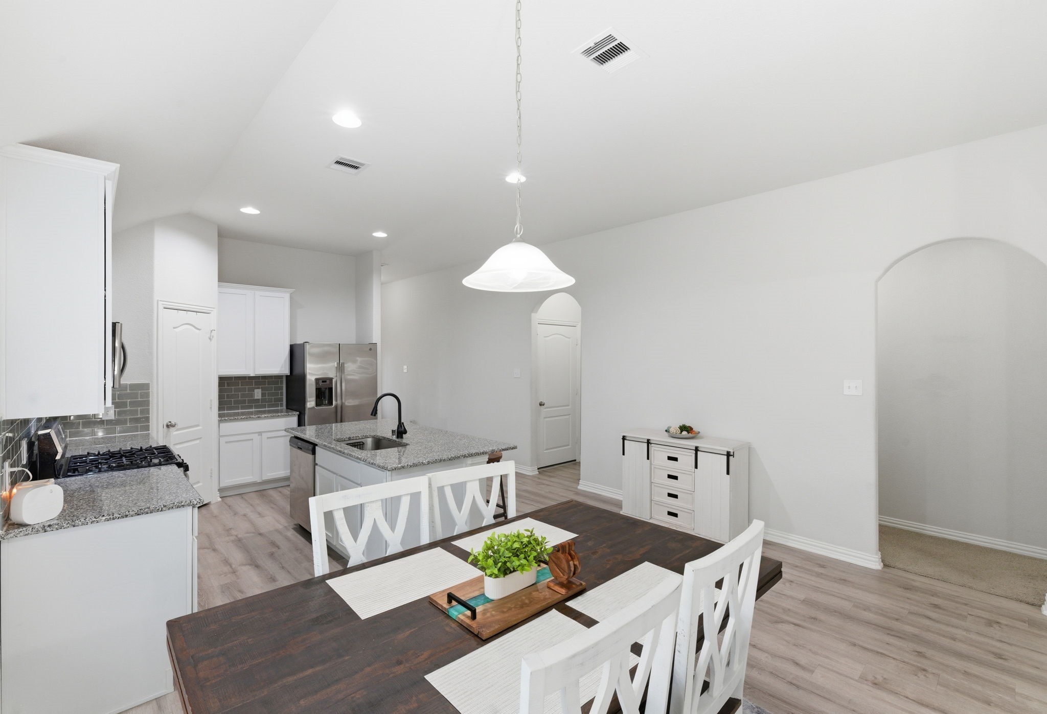 27146 Grey Fox Run Magnolia, TX 77354 - Photo 15 of 44 a living room with furniture and a dining table