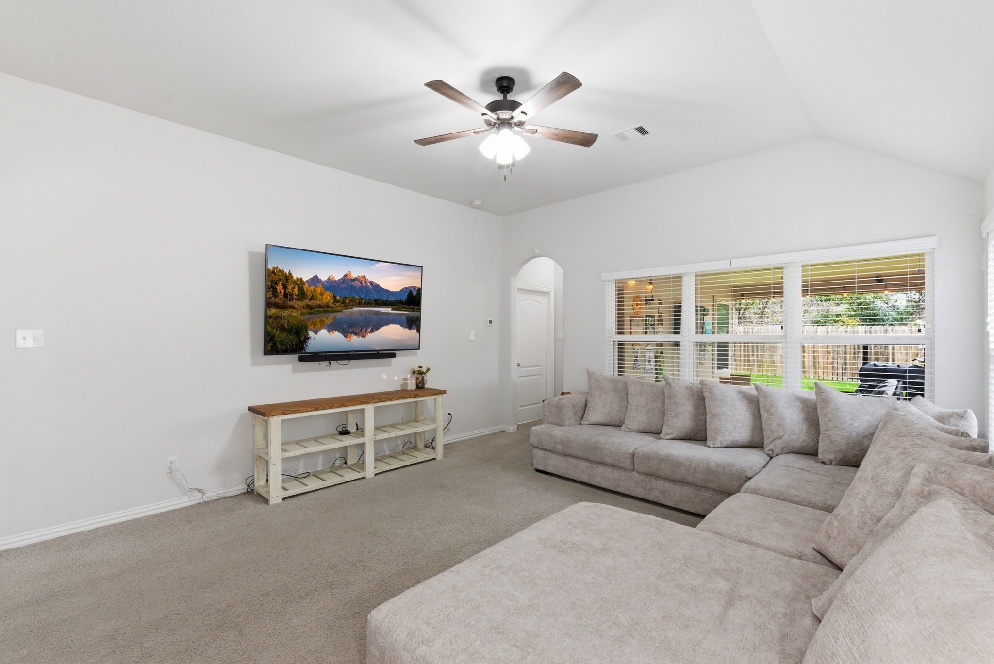 27146 Grey Fox Run Magnolia, TX 77354 - Photo 18 of 44 a living room with furniture and a flat screen tv