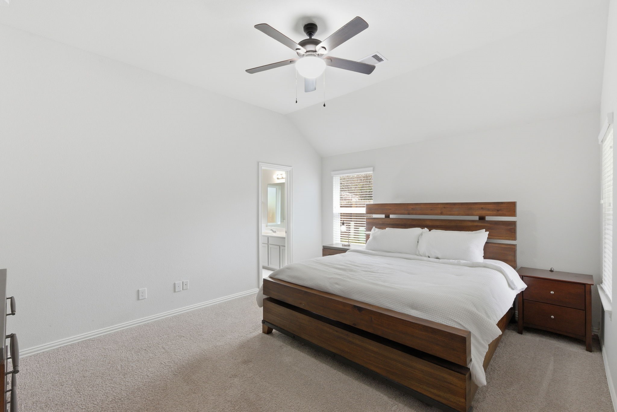 27146 Grey Fox Run Magnolia, TX 77354 - Photo 20 of 44 a bedroom with a bed and a ceiling fan