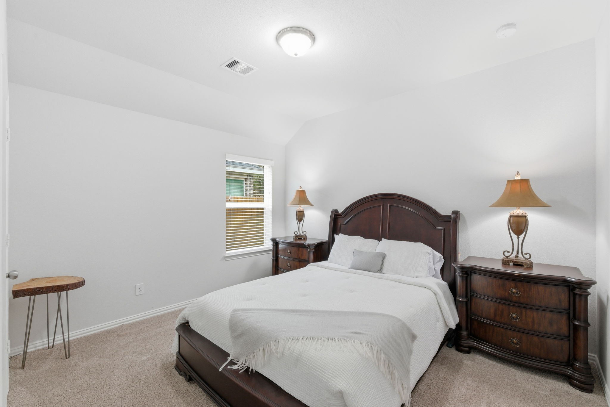 27146 Grey Fox Run Magnolia, TX 77354 - Photo 25 of 44 a bedroom with a bed and a lamp