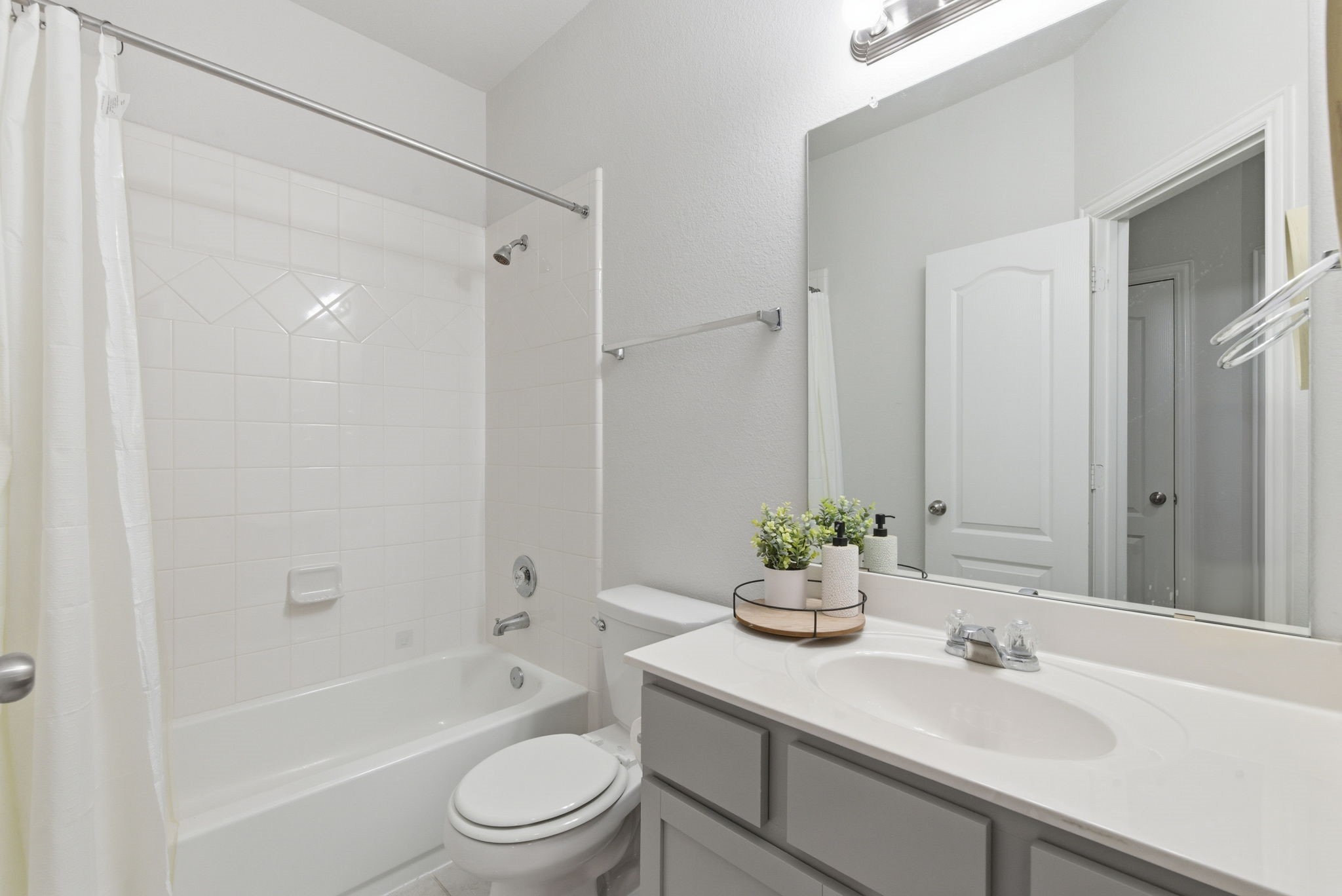 27146 Grey Fox Run Magnolia, TX 77354 - Photo 30 of 44 a bathroom with a sink a toilet and shower