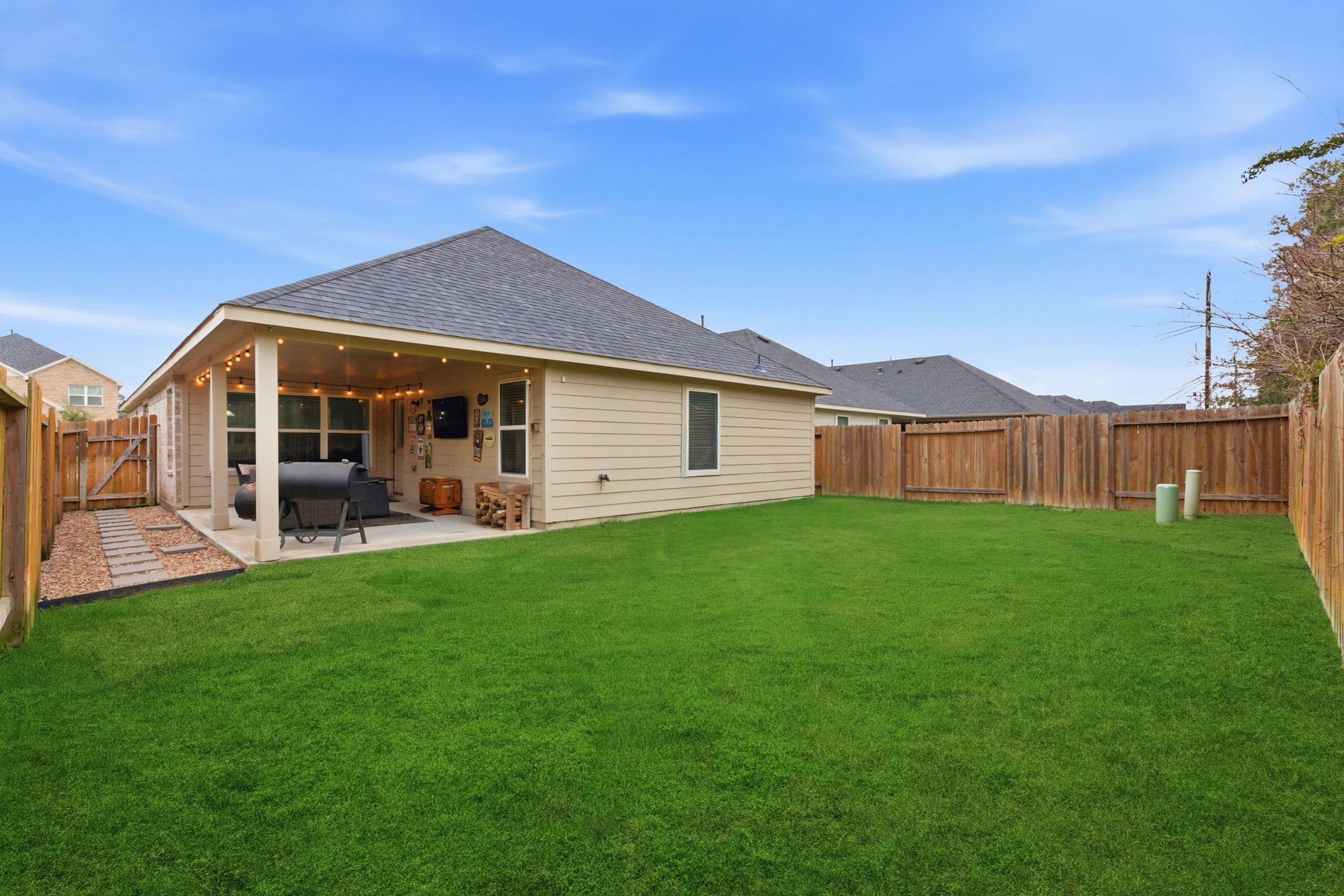 27146 Grey Fox Run Magnolia, TX 77354 - Photo 37 of 44 a view of a house with a backyard