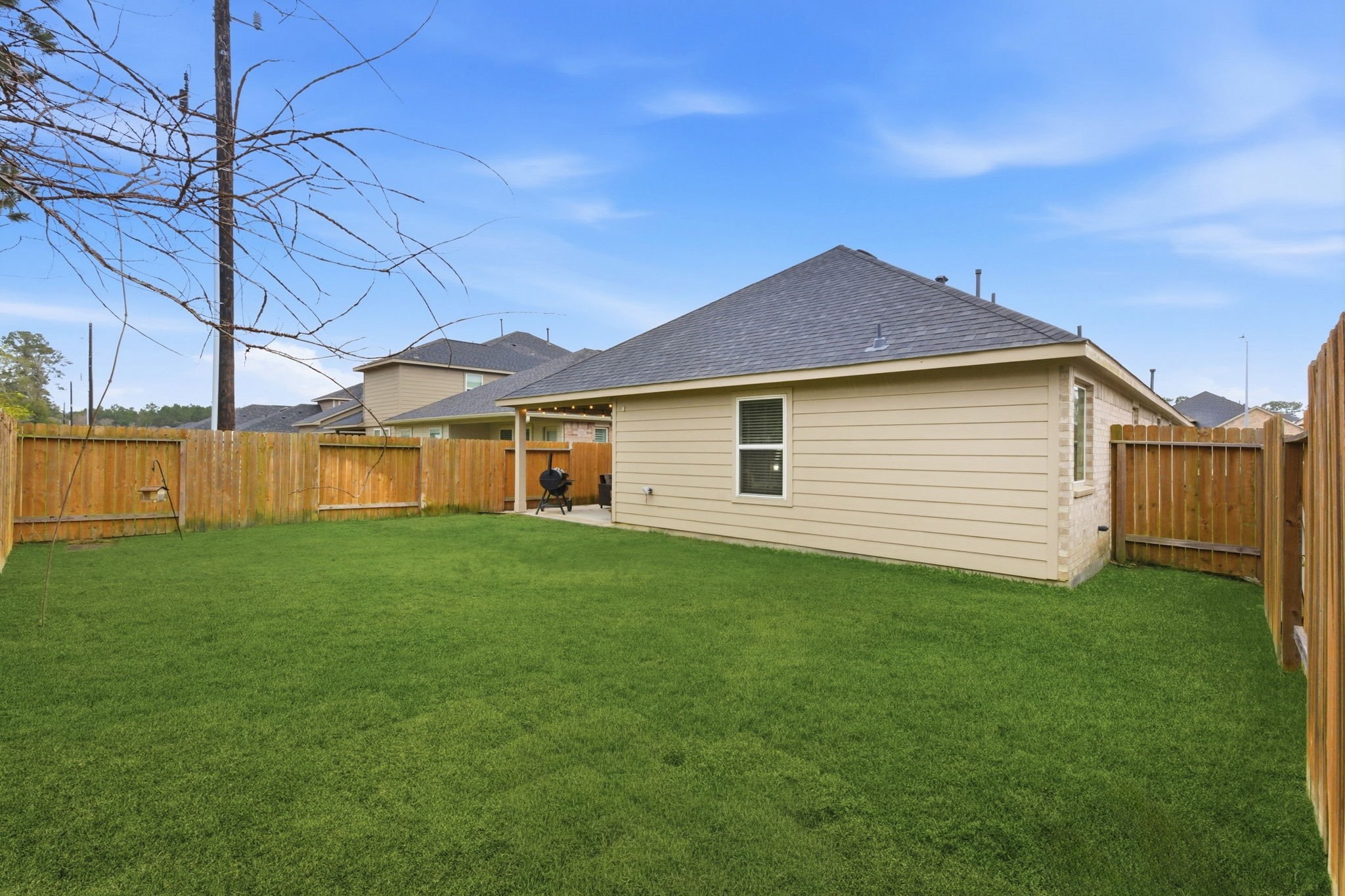 27146 Grey Fox Run Magnolia, TX 77354 - Photo 38 of 44 a view of a backyard with a garden