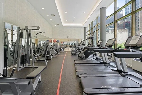 325 5th Avenue, Unit 39C Manhattan, NY 10016 - Photo 18 of 19 a view of a room with gym equipment