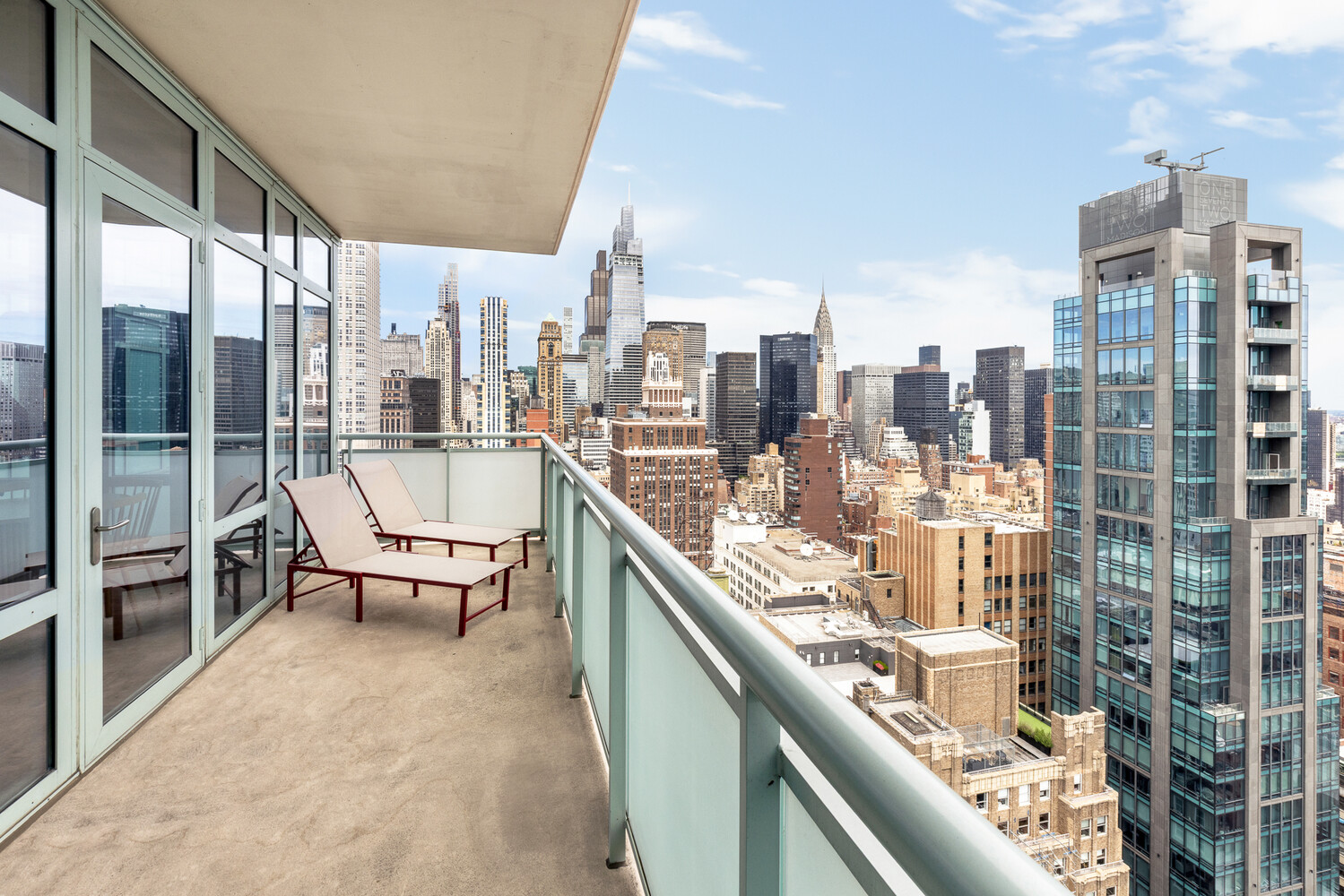 325 5th Avenue, Unit 39C Manhattan, NY 10016 - Photo 3 of 19 a balcony with city view