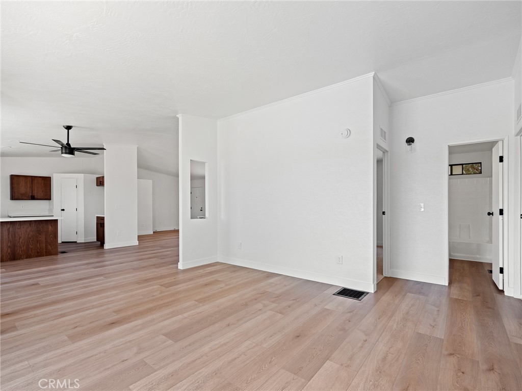 10139 Sonora Road Phelan, CA 92371 - Photo 13 of 37 a view of a kitchen with wooden floor and a kitchen space