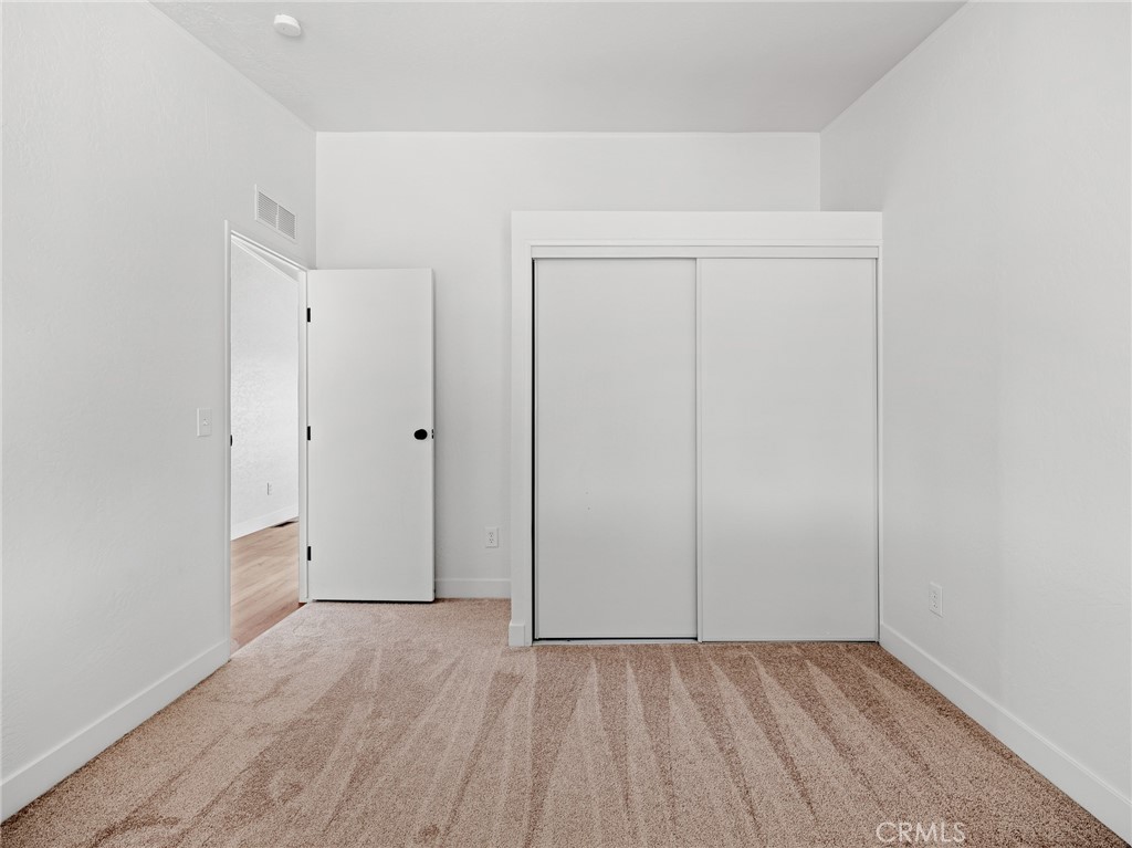 10139 Sonora Road Phelan, CA 92371 - Photo 20 of 37 wooden floor in an empty room