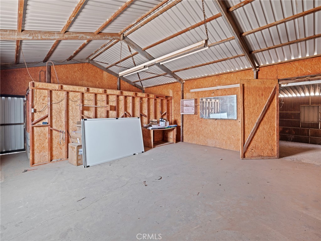 10139 Sonora Road Phelan, CA 92371 - Photo 29 of 37 a view of a room with wooden walls