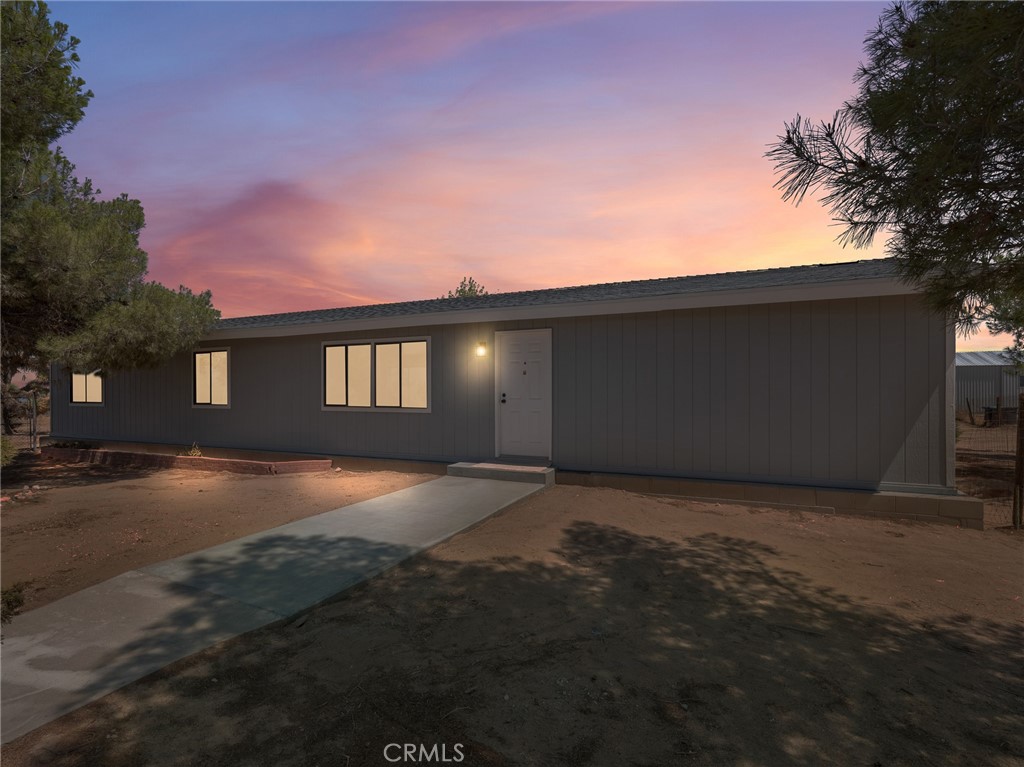 10139 Sonora Road Phelan, CA 92371 - Photo 31 of 37 a view of backyard of a house