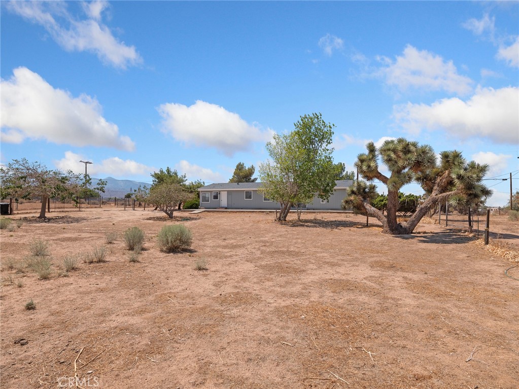 10139 Sonora Road Phelan, CA 92371 - Photo 35 of 37 a view of swimming pool with a yard