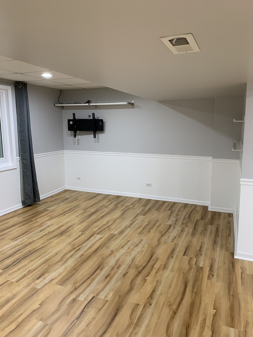 11860 Presley Circle Plainfield, IL 60585 - Photo 17 of 18 wooden floor in a room