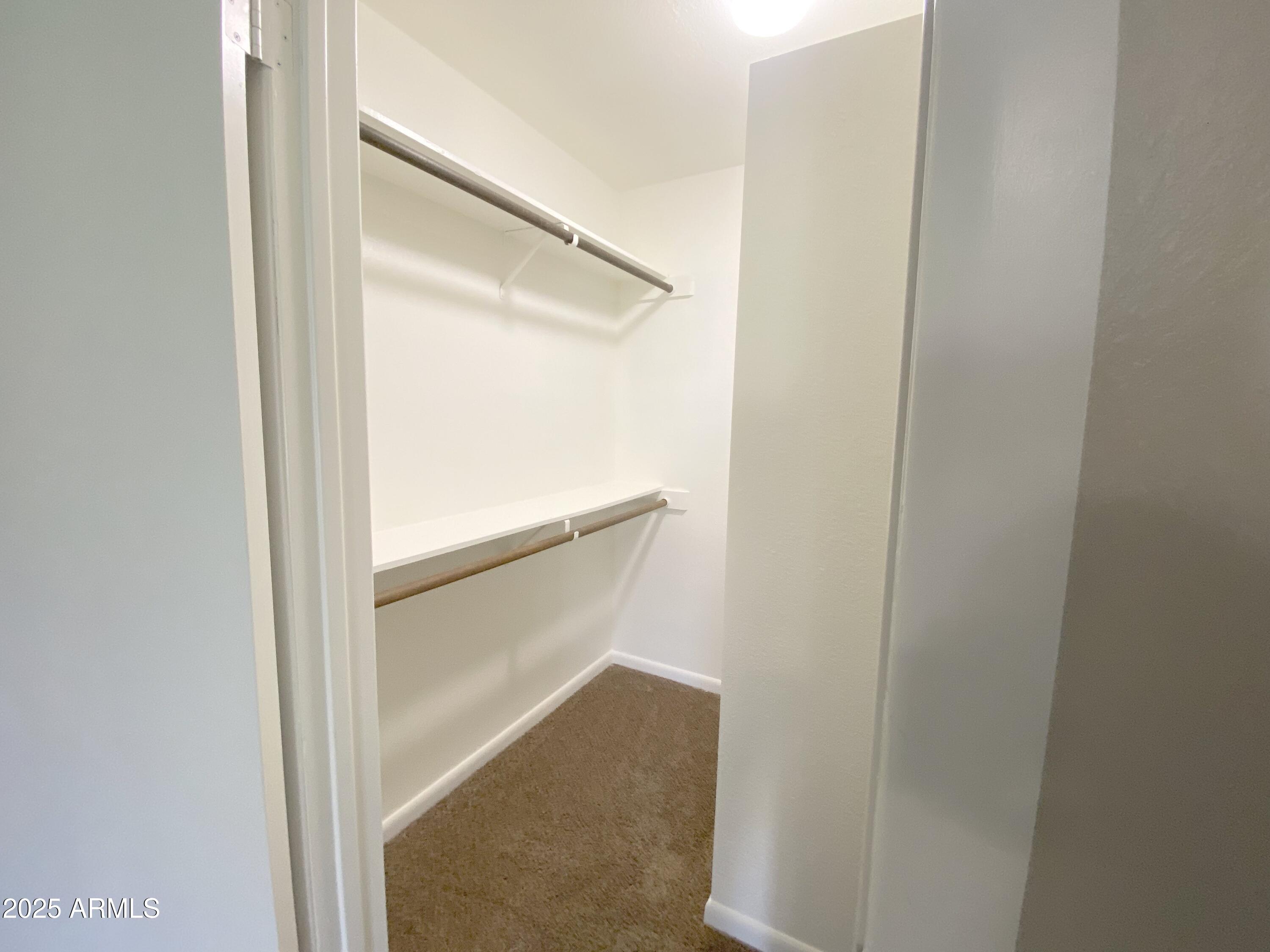 10417 North 95th Drive, Unit B Peoria, AZ 85345 - Photo 6 of 18 a view of closet