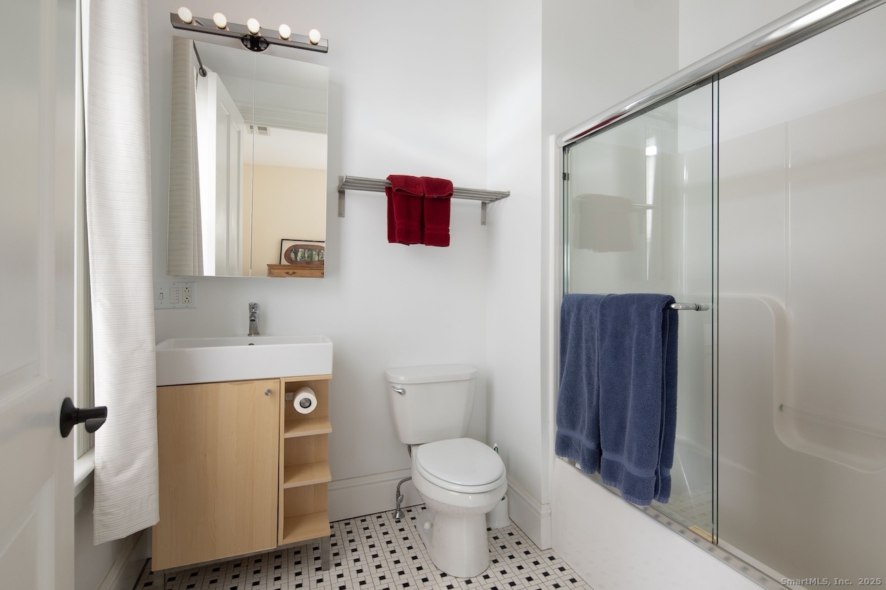 31 Sharon Road, Unit 3 Salisbury, CT 06039 - Photo 8 of 13 a bathroom with a toilet sink and shower