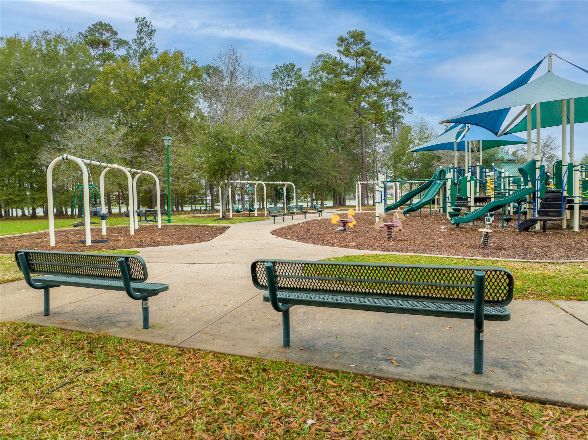 4227 Maple Rapids Lane Spring, TX 77386 - Photo 13 of 16 a swimming pool with outdoor seating and trees