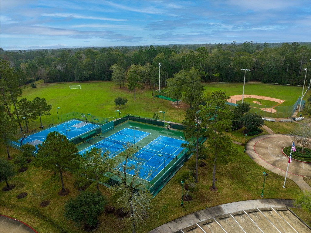 4227 Maple Rapids Lane Spring, TX 77386 - Photo 15 of 16 a view of a golf course with a yard
