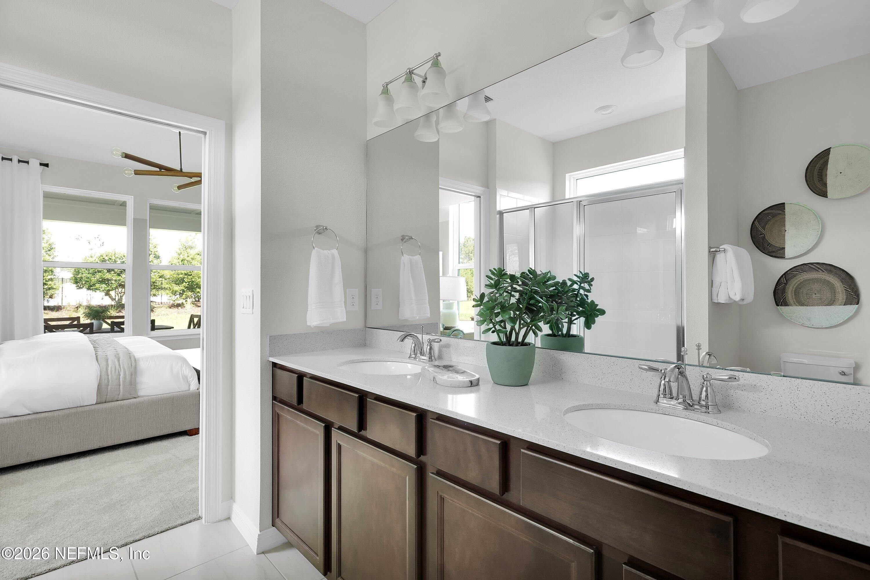 614 Ecliptic Loop Yulee, FL 32097 - Photo 16 of 41 Compass Owner's Bathroom
