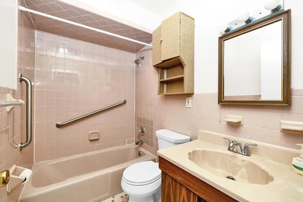 a view of staircase with white walls