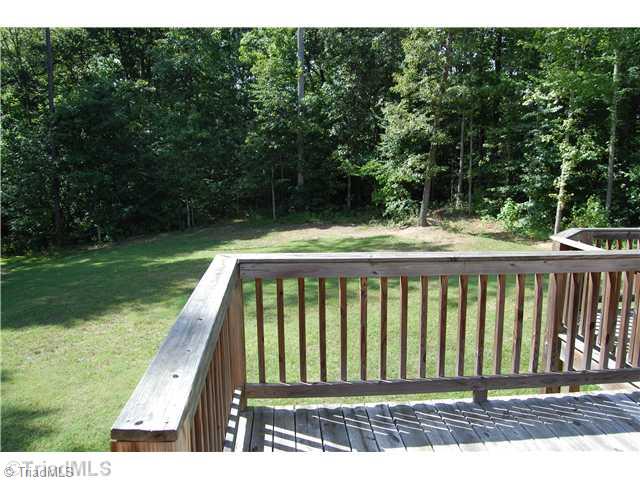 2725 Rowe Road Lexington, NC 27295 - Photo 14 of 16 Patio/Deck. Large deck has a nice nook for grilling or hot tub and overlooks a private, level back yard with options for play and/or pool or creating your own backyard retreat.