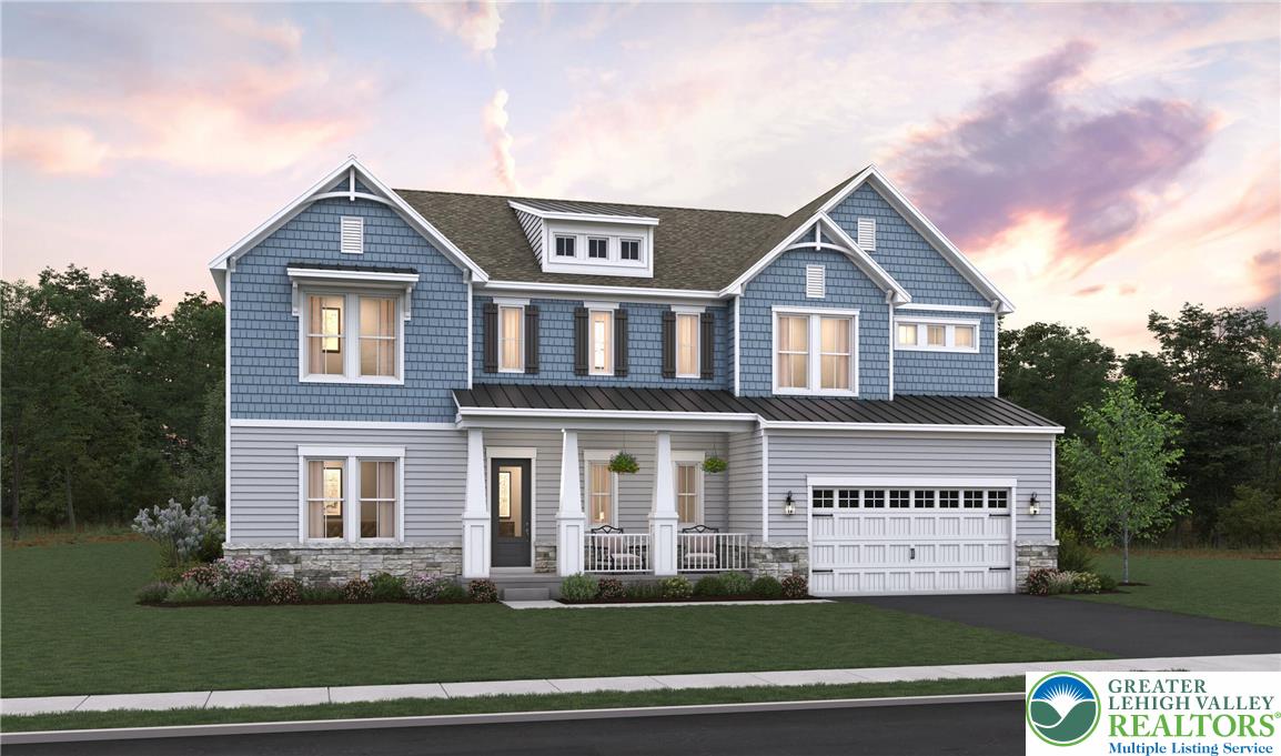a view of a big house with a big yard and large trees