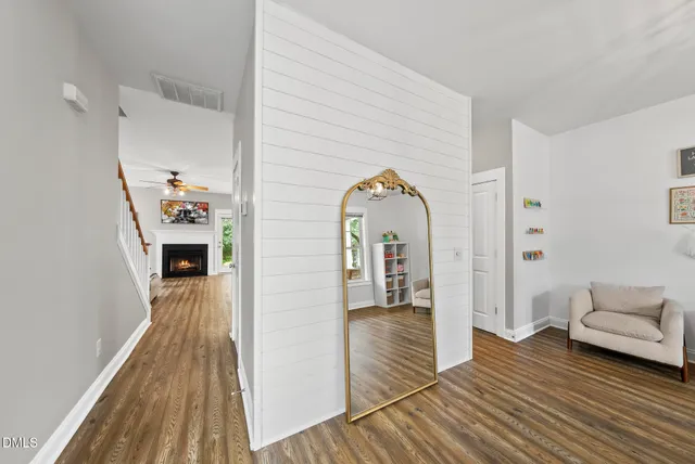 a view of livingroom with furniture and wooden floor